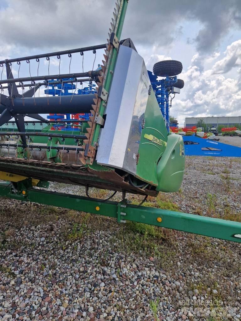 John Deere T670 حصادات