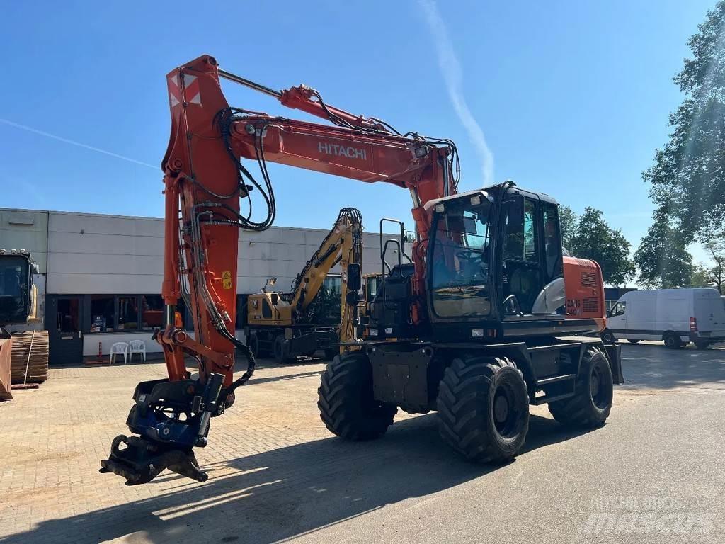 Hitachi 140W حفارات بعجل