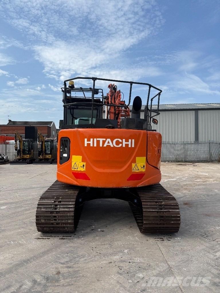 Hitachi ZX 135 US-6 حفارات زحافة