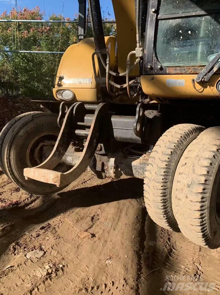 CAT 315 D حفارات بعجل