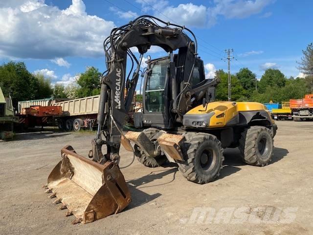 Mecalac 12 MTX حفارات بعجل