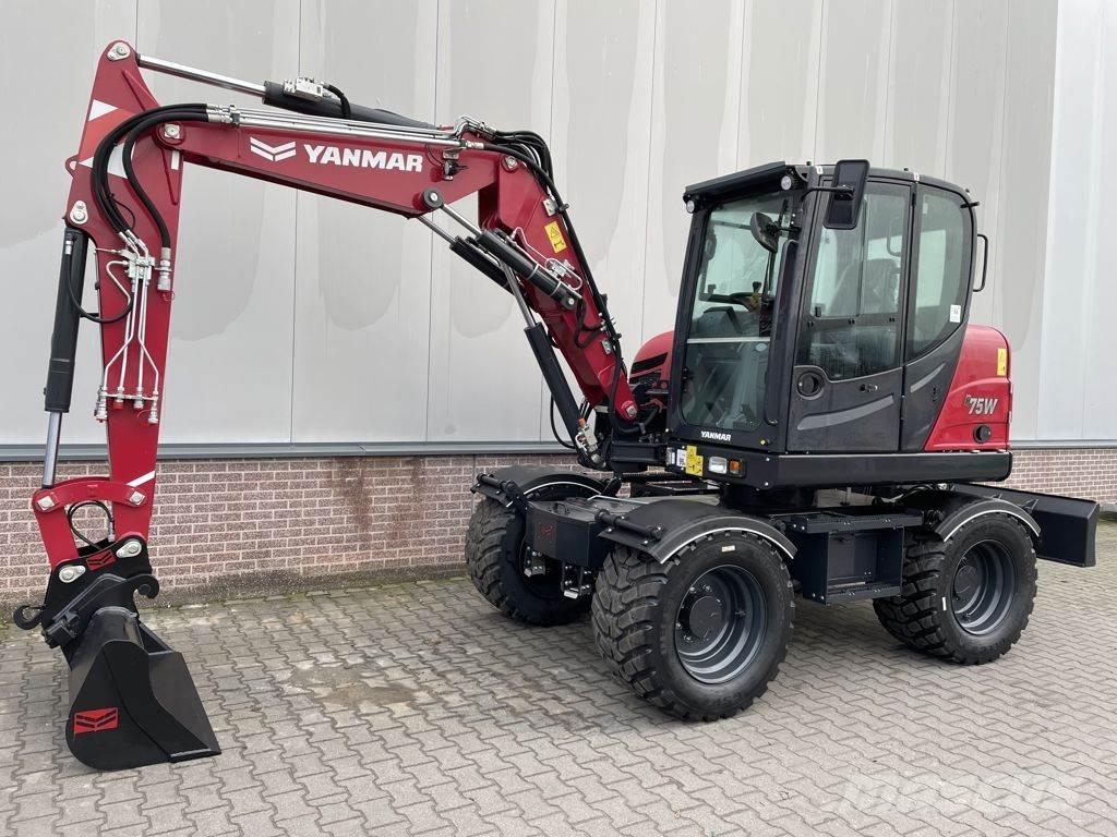 Yanmar B75W حفارات بعجل