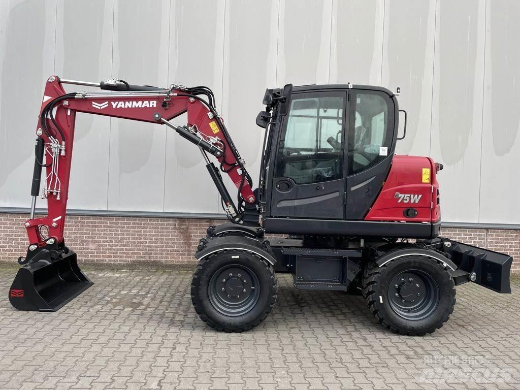 Yanmar B75W حفارات بعجل