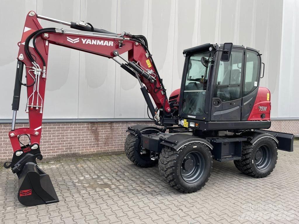 Yanmar B75W حفارات بعجل