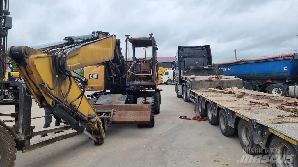 CAT M 316 F حفارات بعجل