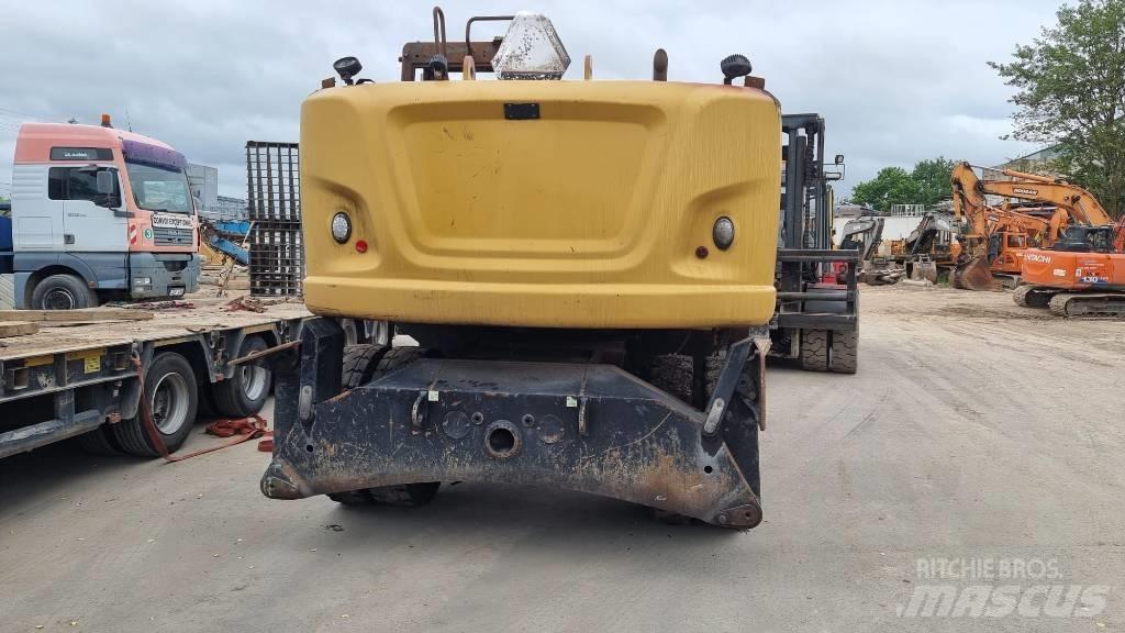CAT M 316 F حفارات بعجل