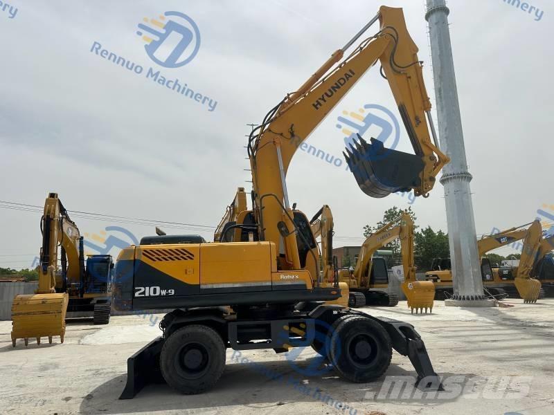 Hyundai R210W-9 حفارات بعجل