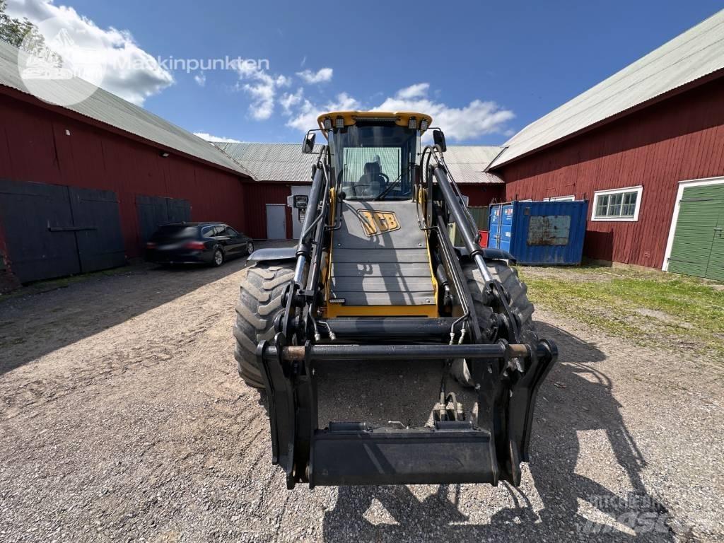 JCB 412 لوادر بعجل
