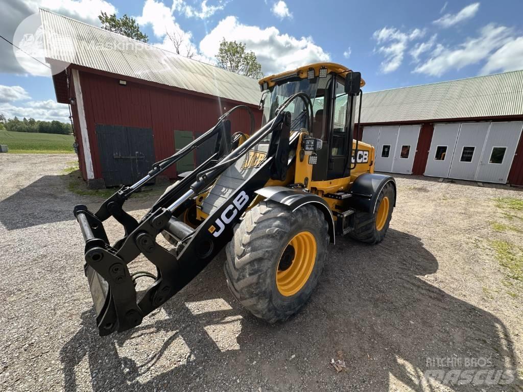 JCB 412 لوادر بعجل