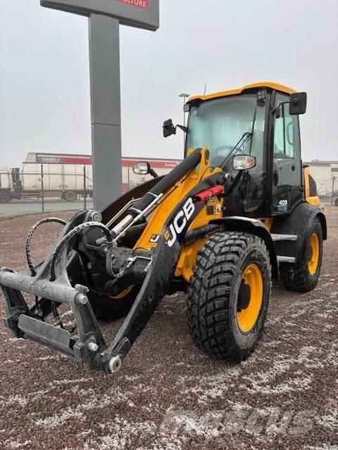 JCB 409 لوادر بعجل