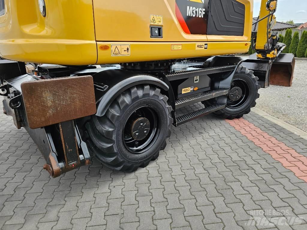 CAT M 316 F حفارات بعجل