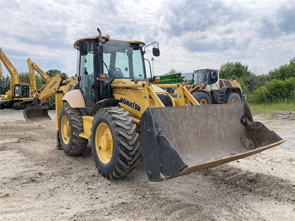 Komatsu WB93S-5E0 لوادر ذات جرافات عكسية