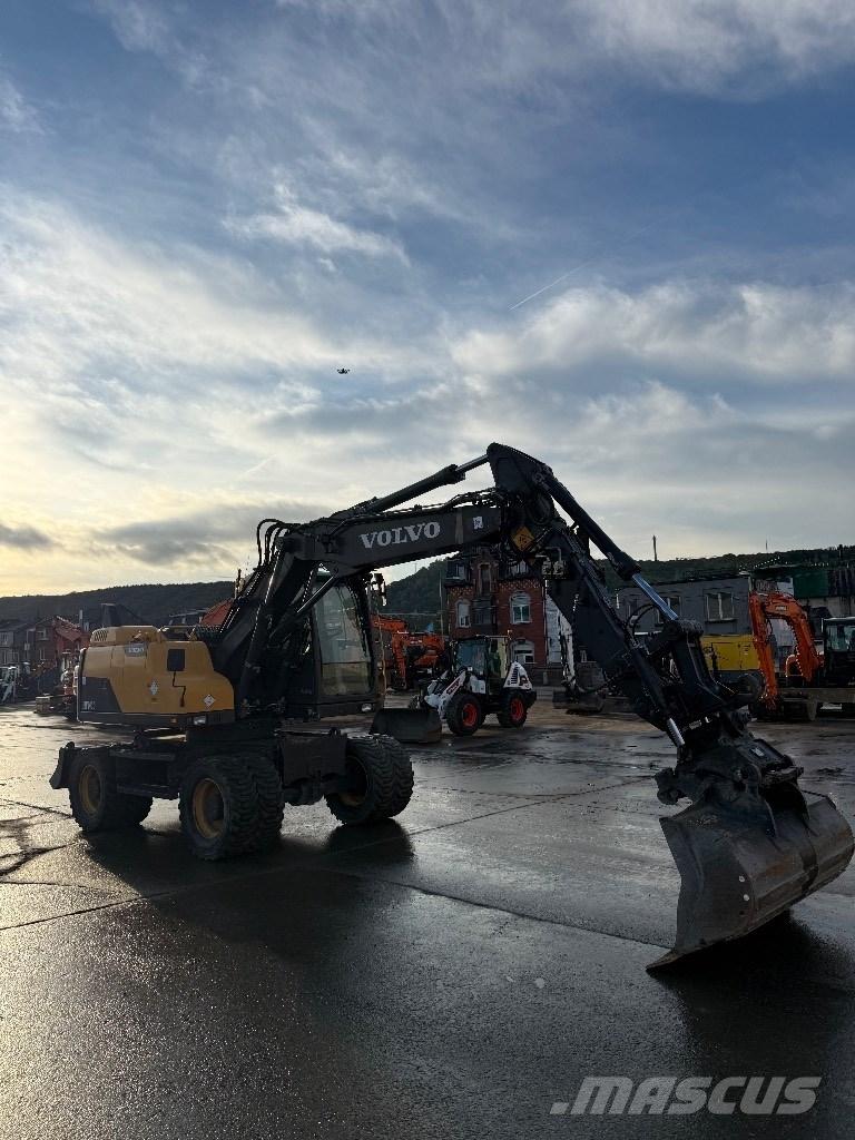 Volvo EW 140 D حفارات بعجل