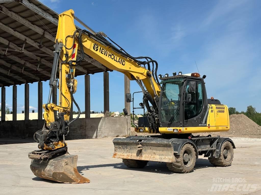 New Holland WE 150 B حفارات بعجل