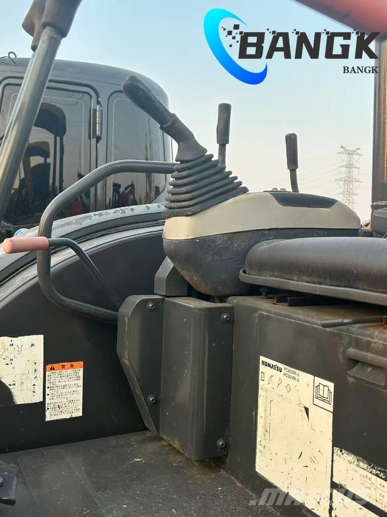  KOMΛ1‘SU PC40-MR حفارات زحافة