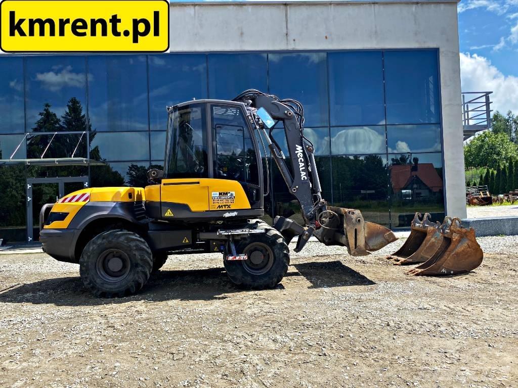 Mecalac 12 M TX لوادر ذات جرافات عكسية