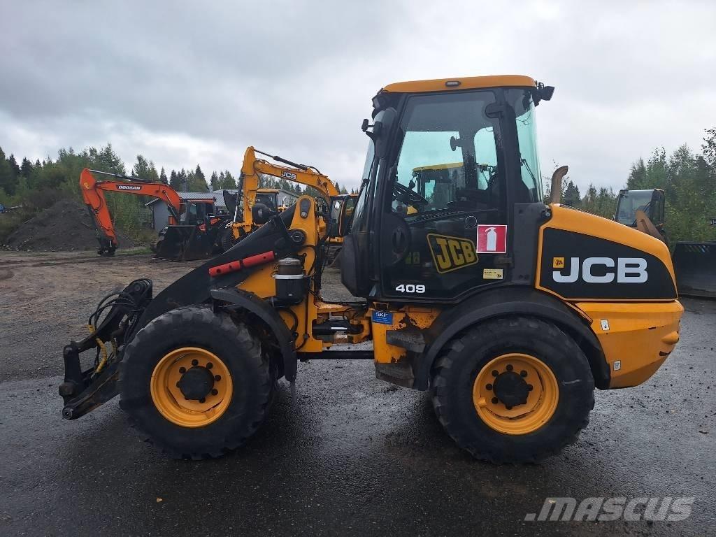 JCB 409 لوادر بعجل