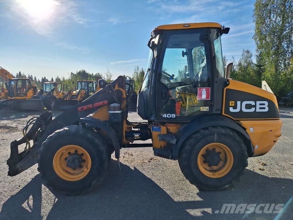 JCB 409 لوادر بعجل