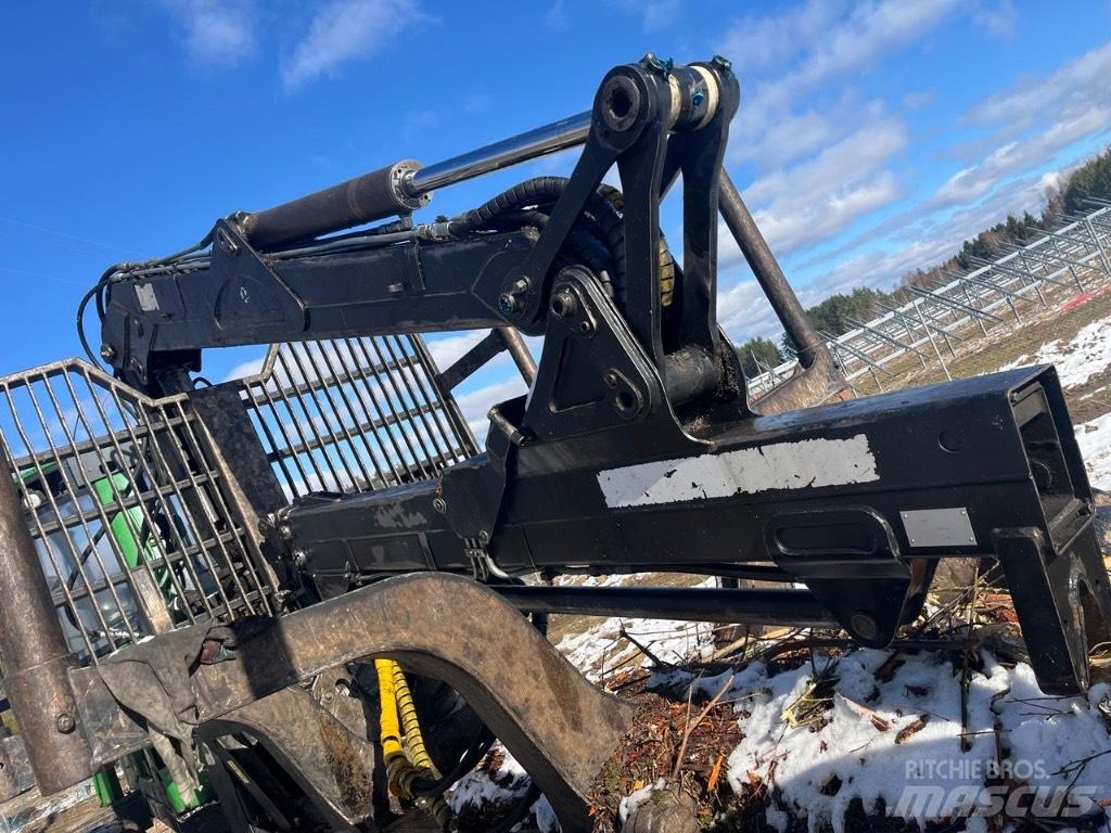 John Deere 1110 E شاحنات