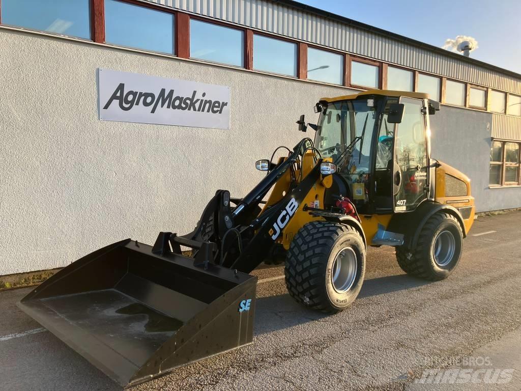 JCB 407 لوادر بعجل