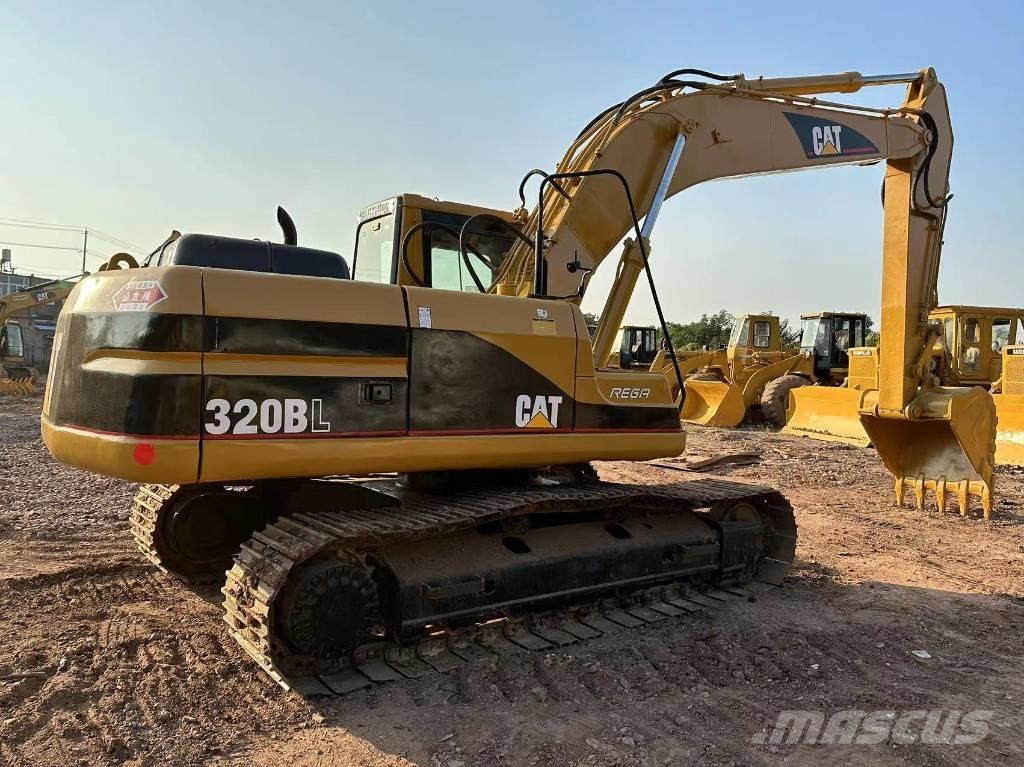 CAT 320 B L حفارات زحافة