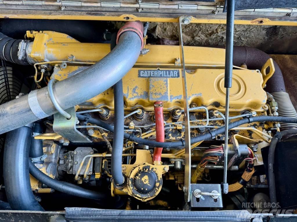 CAT M 316 C حفارات بعجل
