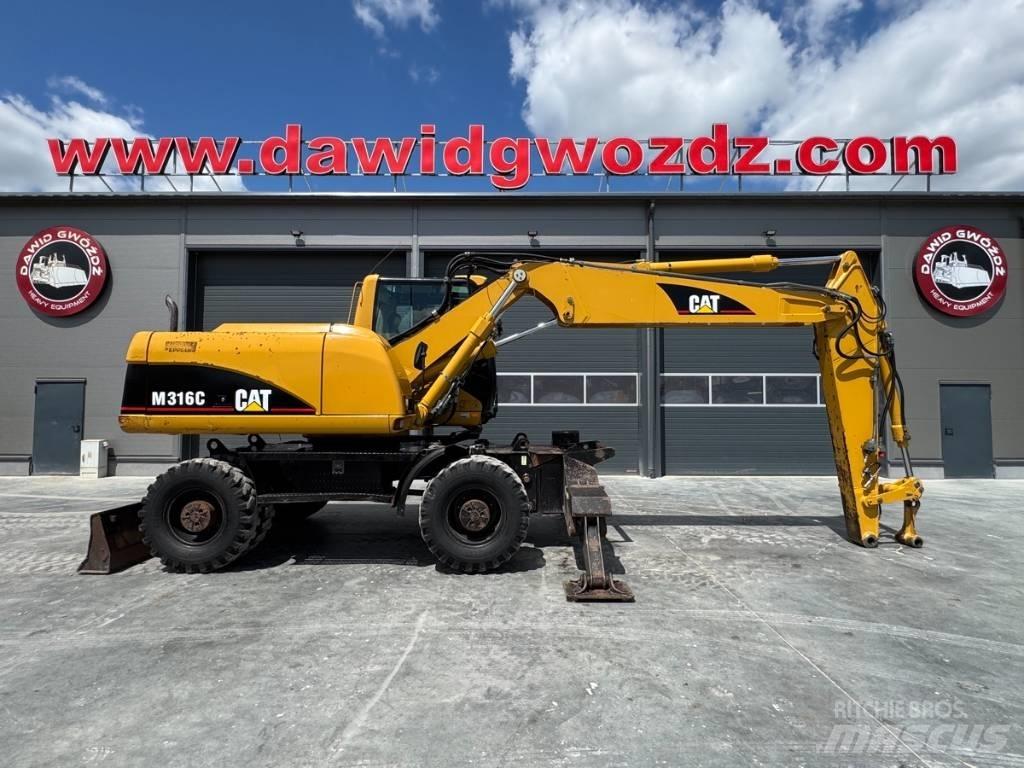 CAT M 316 C حفارات بعجل