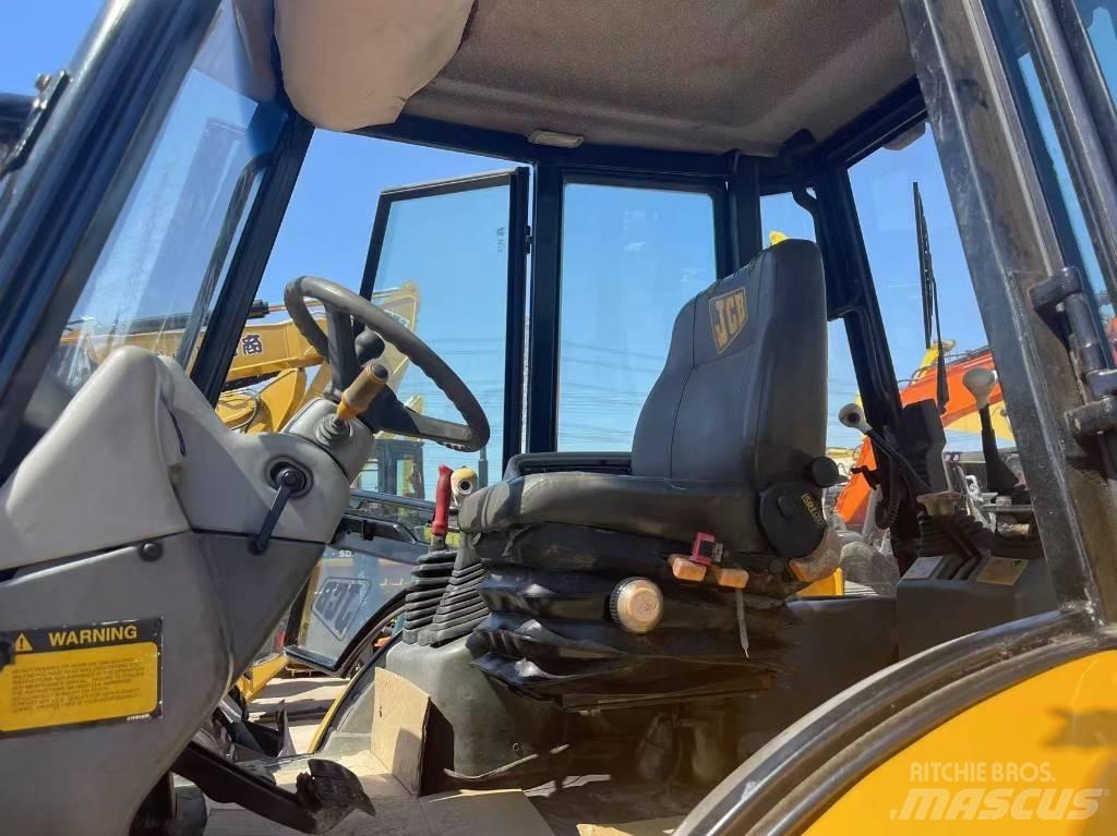 JCB 4 CX لوادر ذات جرافات عكسية