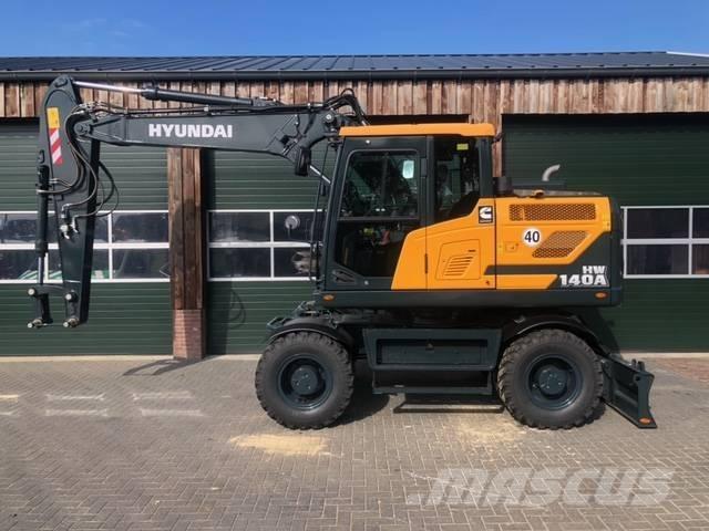 Hyundai HW 140 A حفارات بعجل