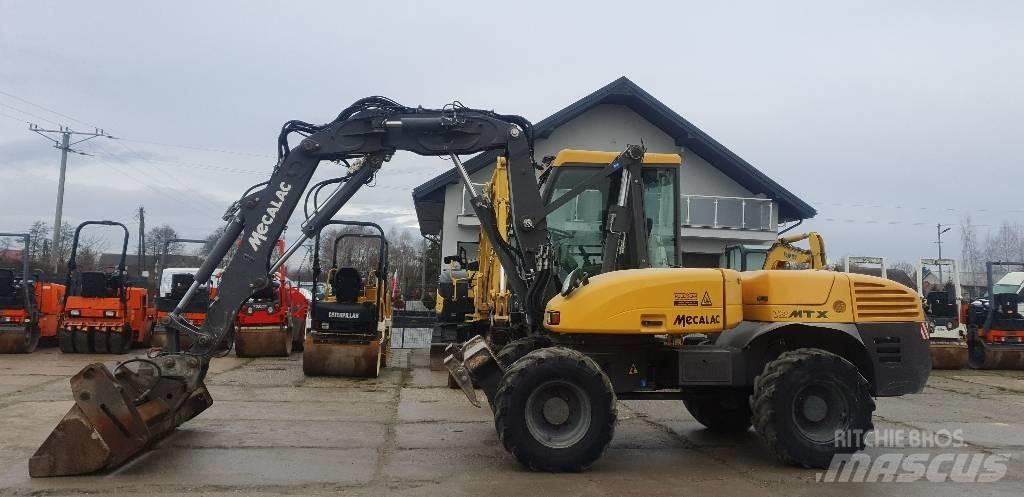 Mecalac 12 M TX حفارات بعجل