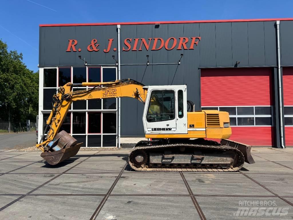 Liebherr R 312 حفارات زحافة