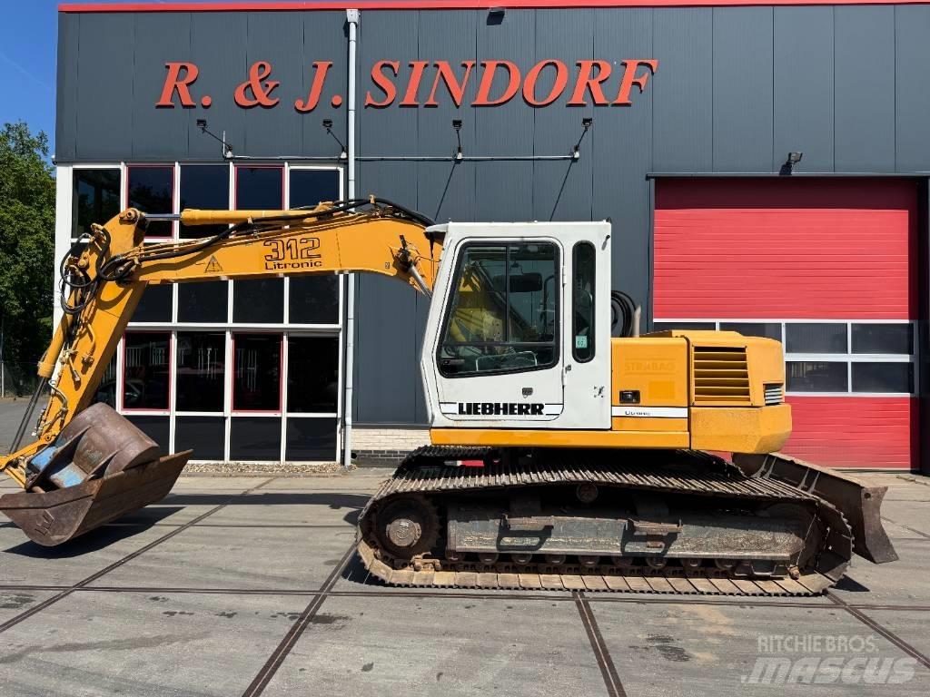 Liebherr R 312 حفارات زحافة