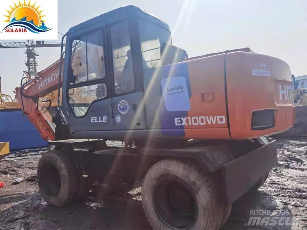 Hitachi EX 100 W D حفارات بعجل