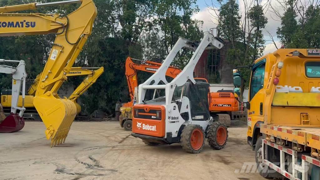Bobcat S 770 لوادر انزلاقية التوجيه