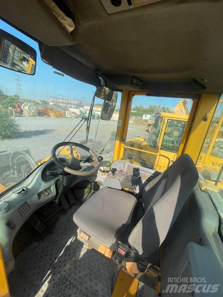Volvo L 180 E لوادر بعجل