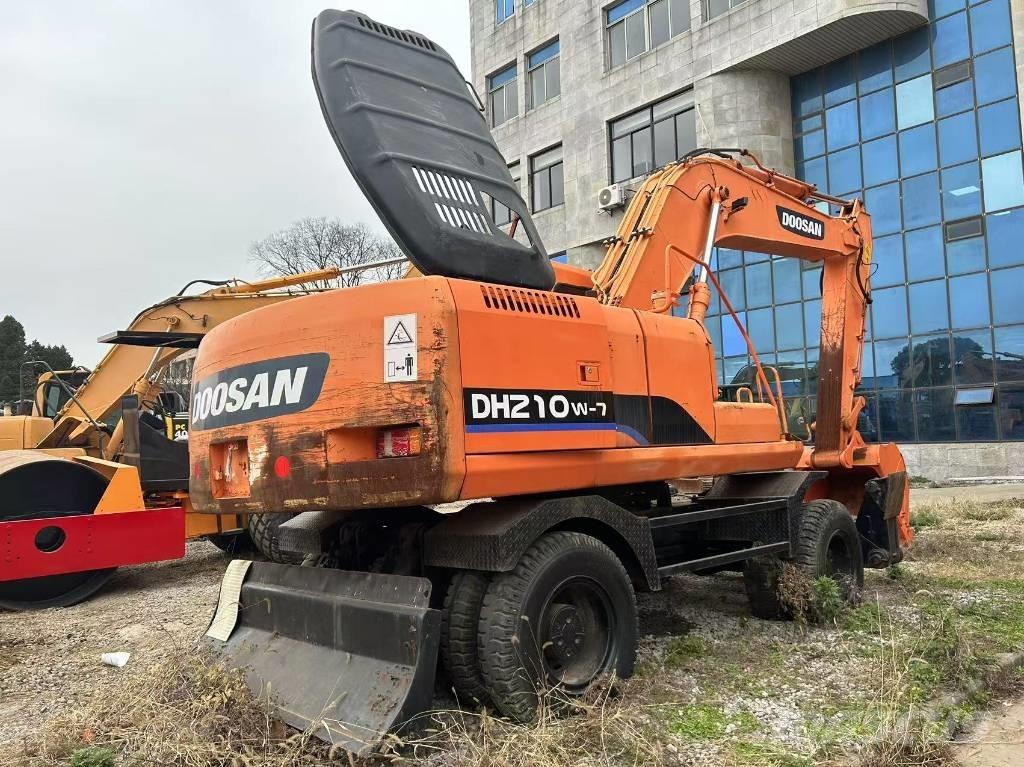 Doosan DH 210 W-7 حفارات بعجل