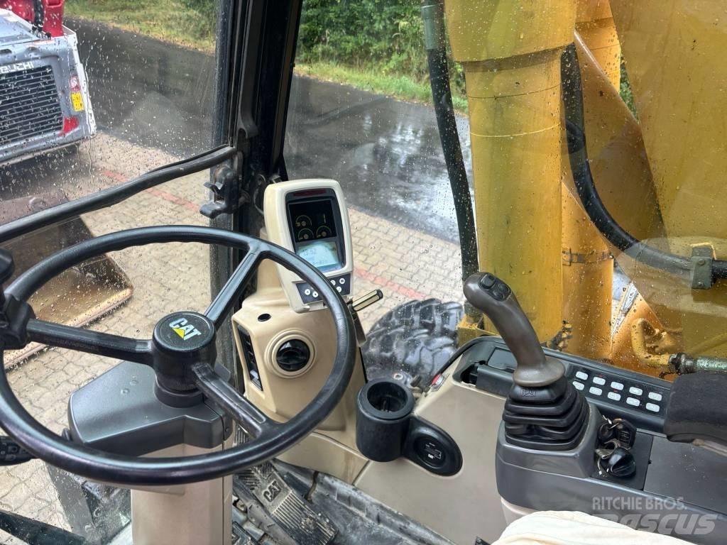 CAT M 316 C حفارات بعجل