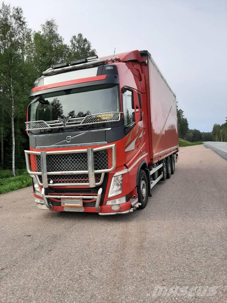 Volvo FH 13 شاحنات نقل ألواح الخشب