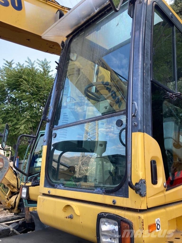 Komatsu PW 140-7 حفارات بعجل