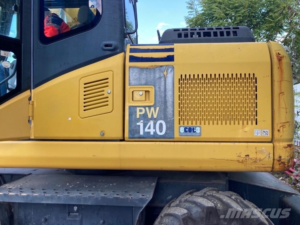 Komatsu PW 140-7 حفارات بعجل