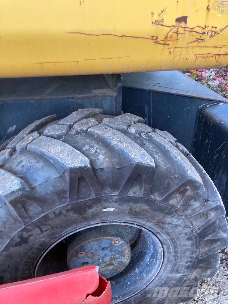 Komatsu PW 140-7 حفارات بعجل