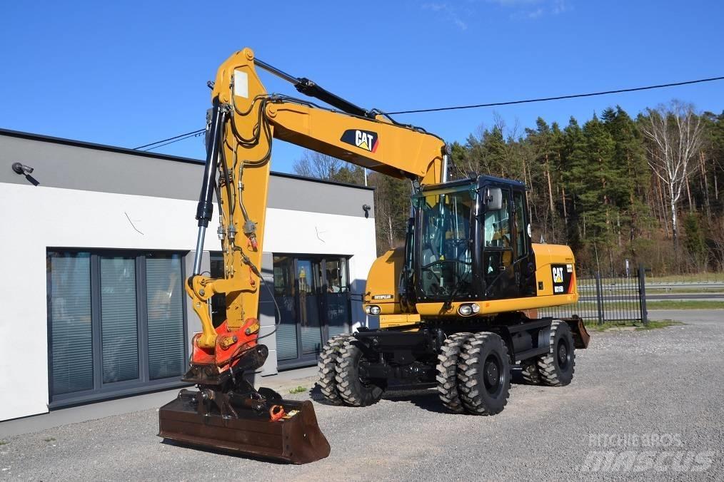 CAT CAT  M 315 D حفارات بعجل