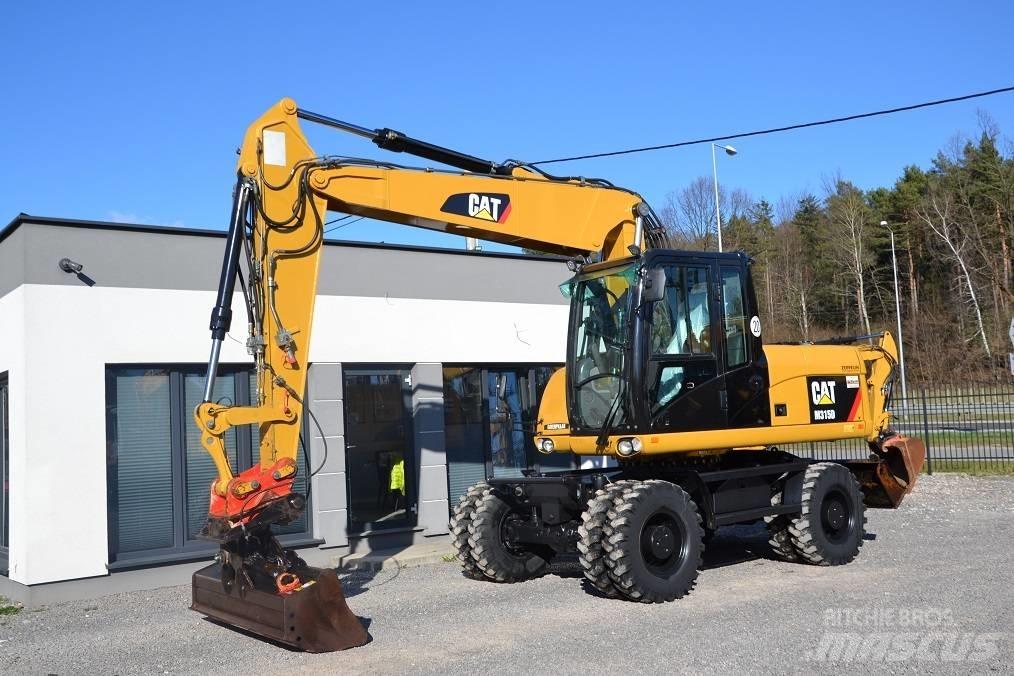 CAT CAT  M 315 D حفارات بعجل