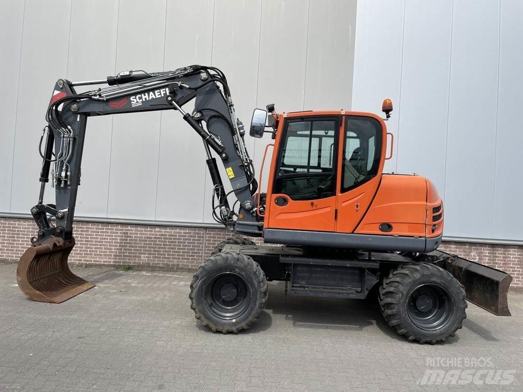 Schaeff TW110 حفارات بعجل