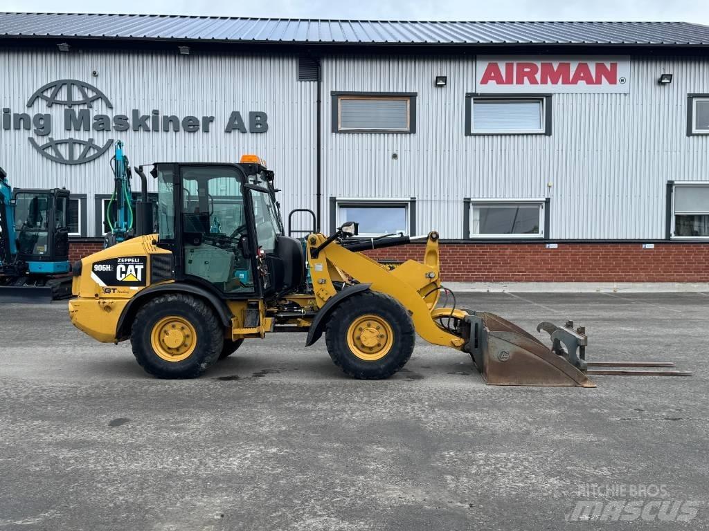 CAT 906 H لوادر بعجل