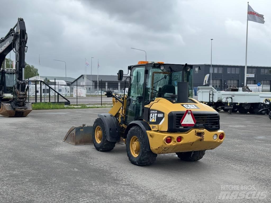 CAT 906 H لوادر بعجل