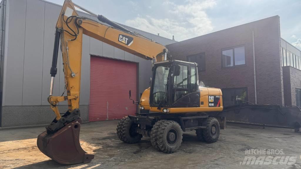 CAT M 316 D حفارات بعجل