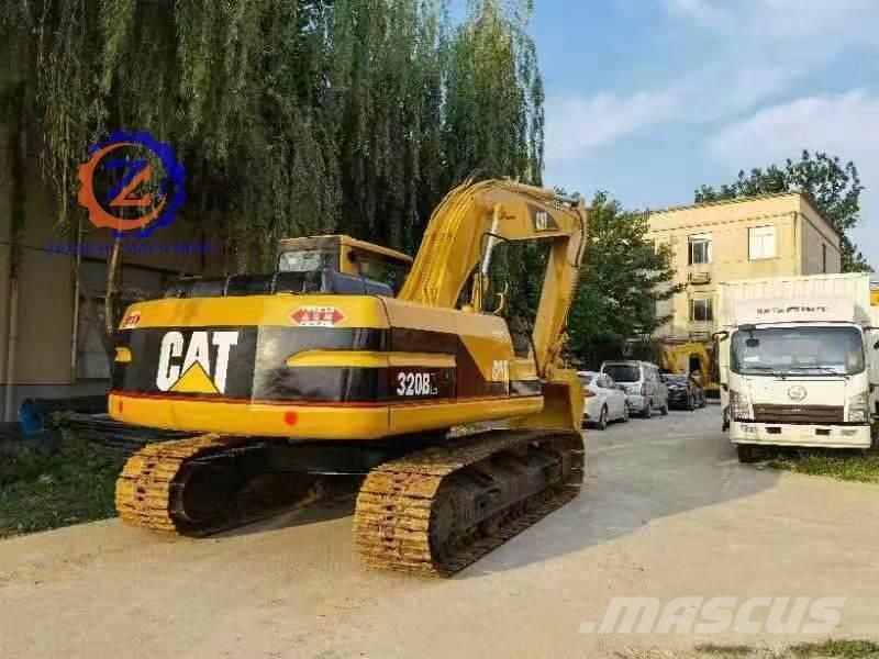 CAT 320 B L حفارات زحافة
