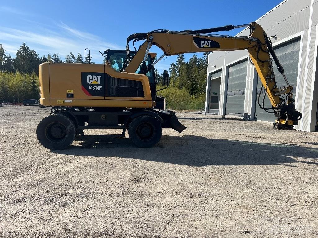 CAT M314F حفارات بعجل