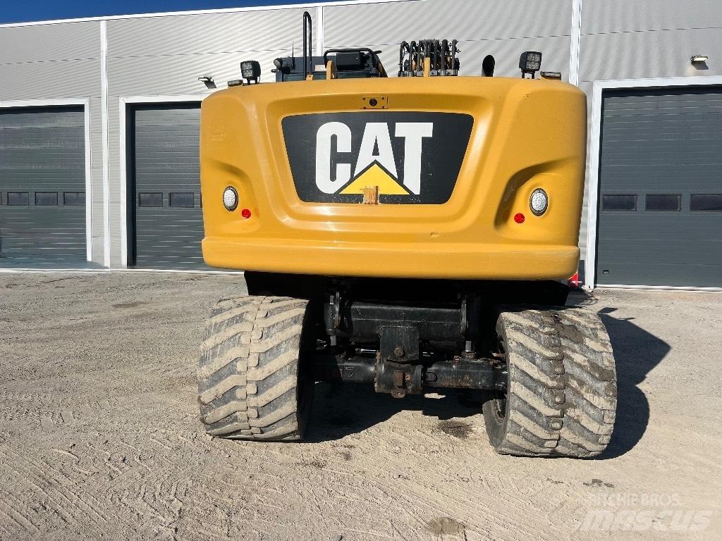 CAT M314F حفارات بعجل
